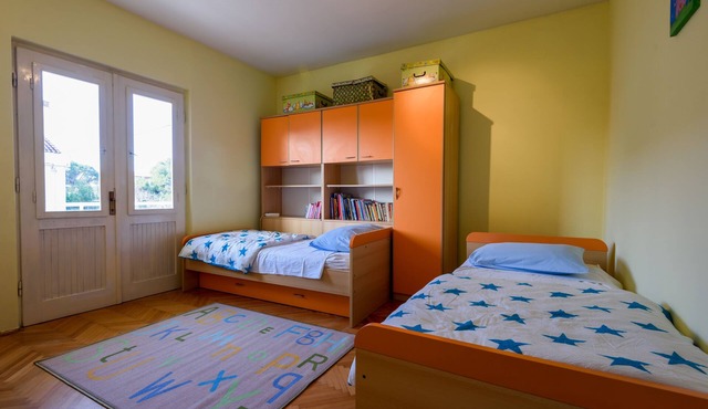 The apartments consists of two bedrooms, a bathroom, a kitchen and a living room