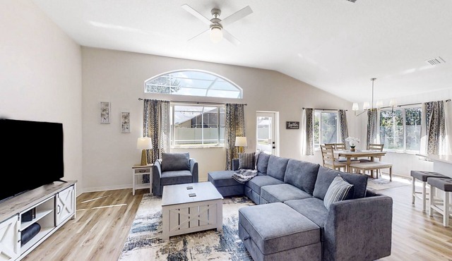 The Barefoot Bungalow | House in Palm Coast with an enclosed pool & grill