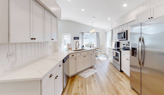The Barefoot Bungalow House in Palm Coast With an Enclosed Pool & Grill