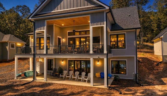 The Bark Shed Lake House with boat dock