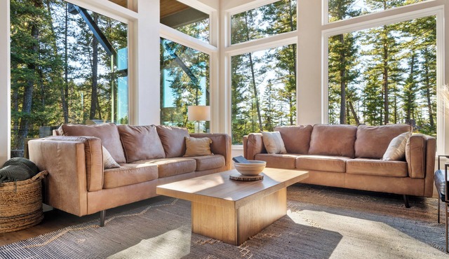 The Basin is a modern, luxury cabin nestled in the pines at the base of Discovery Ski Hill. Enjoy panoramic views of the surrounding forest and the relaxing sounds of a nearby creek while relaxing by a smokeless fire in the Solo stove on the deck.