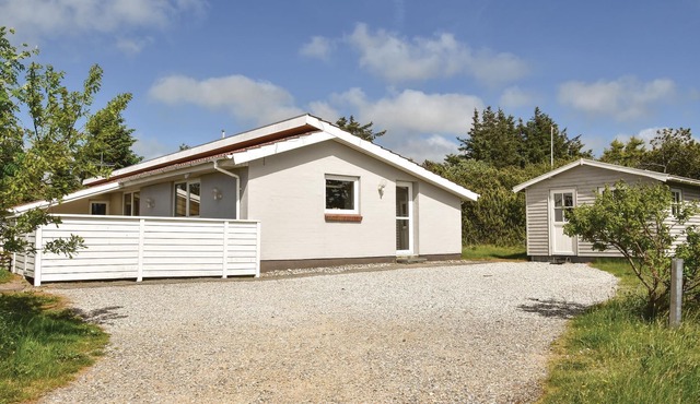 The beautiful nature area of Lodbjerg Hede with its extensive heath landscape and small woods is loc