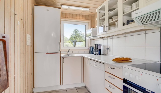 The beautiful vacation home is well placed at the end of a dead end street.