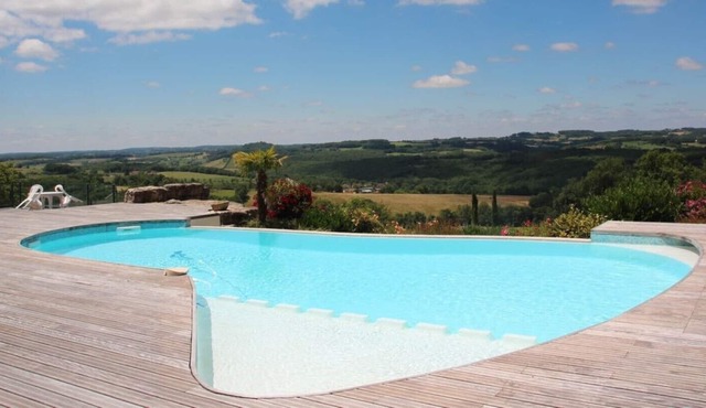 THE BIG HOUSE AND ITS OVERFLOW POOL