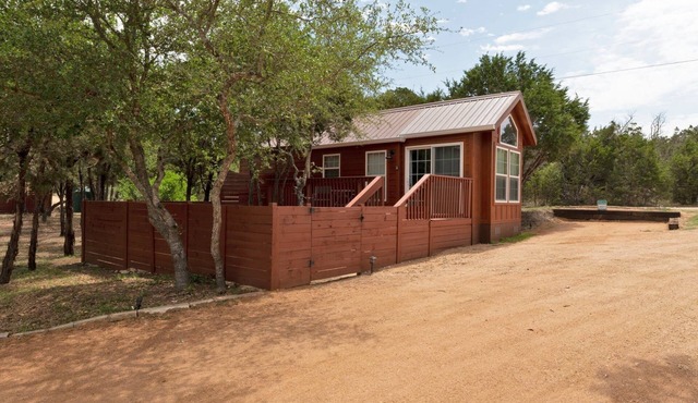 The Bison cabin in a gated 2 acre boutique tiny home resort with pool!
