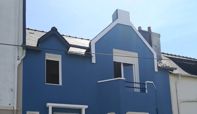 The blue house near the sea