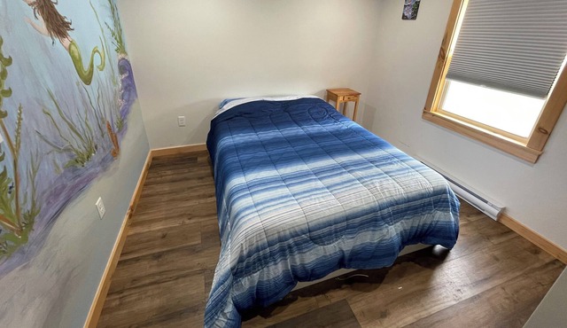 The Blue House in the Orchard