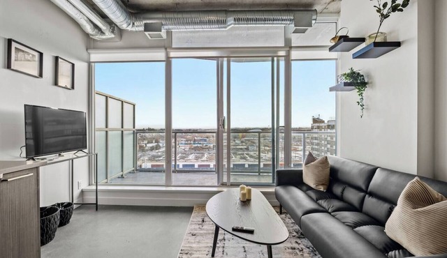 The Brixton - DT Views, by Bow River & Saddledome