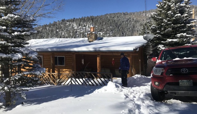 The Cabin back deck offers stunning views and only 15 minutes from Sipapu Skiing