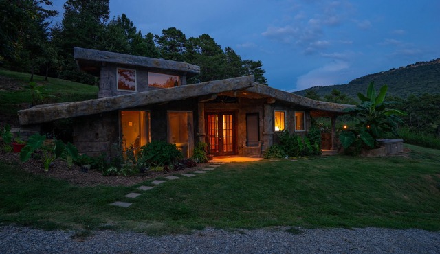 The Cavern on The Green. A unique hand-carved home. Quiet, great views