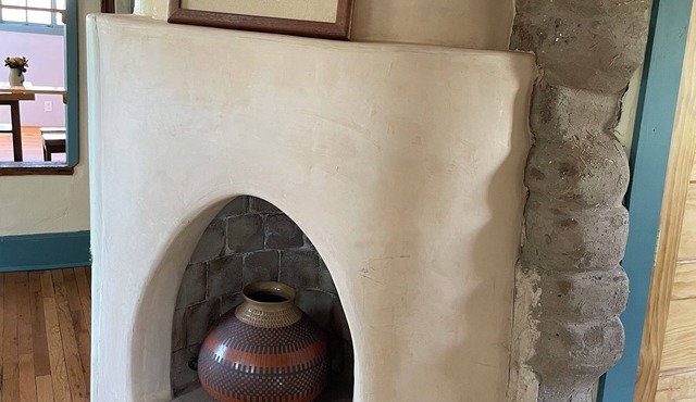 The Cervantes house is a traditional 1800s adobe casa showcasing NM art
