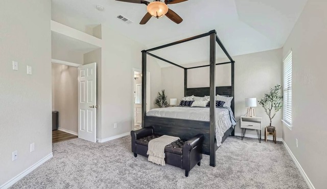 The Clover House Georgetown is the perfect getaway for families or workers seeking a home base while in town. This charming retreat features a warm, inviting interior with modern amenities, a fully equipped kitchen, and comfortable living spaces.