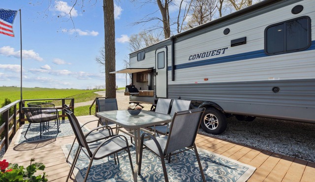 The Coastal Conquest Camper Rental, located on Silver Lake in Delhi, IA