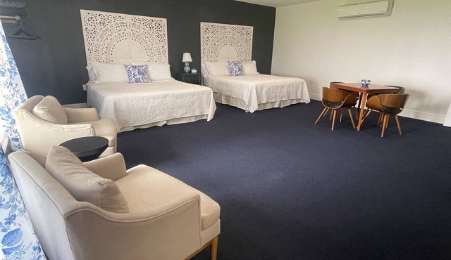 The Cobalt Suite at Diamond on Seneca: Two King Beds with Bay Window