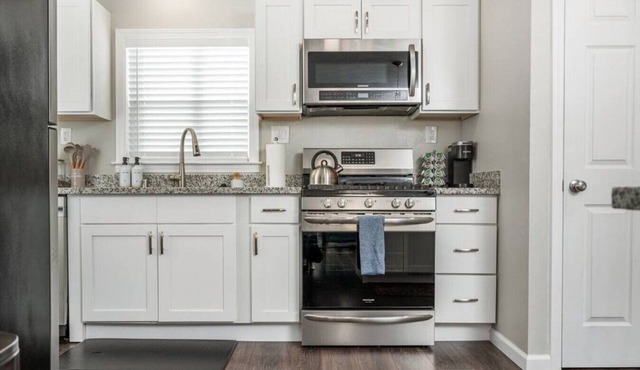 The Concord Cozy · Remodeled Home w/King Bed, Bunk Bed, & Yard Games