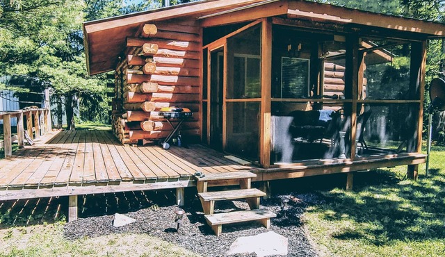The Copper Squirrel is a secluded full log cabin on 10 acres.