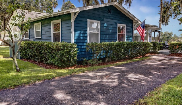 The Cozy Euphoric cottage nestled in nature with relaxing River front views.