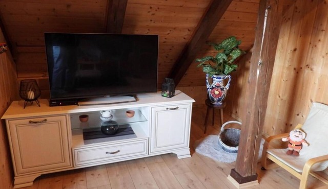 The cozy vacation home offers a hot tub and peace.