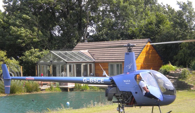 The Derbyshire Boathouse , a secluded lakeside log cabin private fly fishing