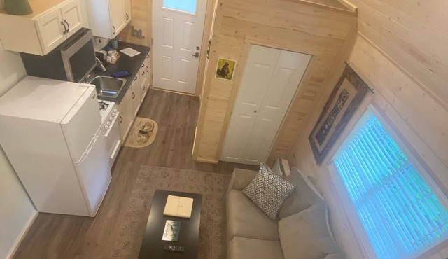 The Denali cabin, beautiful wood interior and vaulted ceilings.