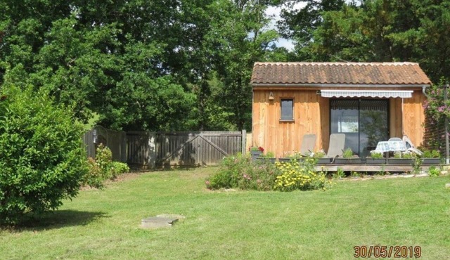 The Ensoleillade Ecological small wooden chalet of 19m2 in garden with view.