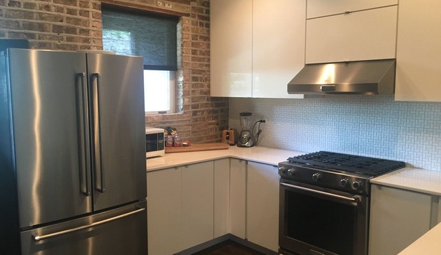 The entire FLAT. Stay Like You Own! Central AIR. TWO FULL BATHROOMS. Unique.