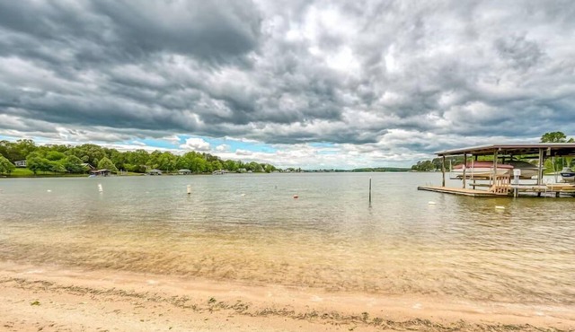 The full Smith Mountain Lake experience: private boat slip, 3 balconies, game room, community pool & beach, propane grill, and pets welcome. No resort fees, ever.