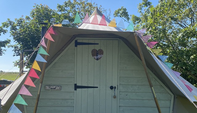 The Glade. Luxury Bell Tent with partial sea and countryside views. Dog friendly