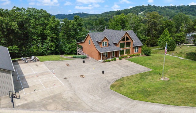 The Hawk's Nest, a 2 Acre 7 Bedroom 5 bath property with 15 beds.