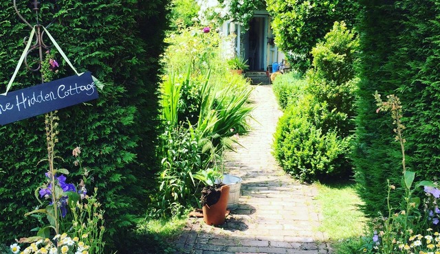 The ‘Hidden Cottage’, a quiet country retreat, overlooking field s and gardens.