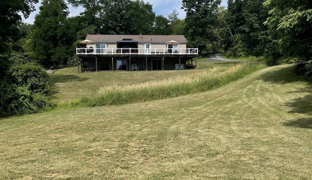 The Hideaway in the Catskills. Sprawling field and game room.