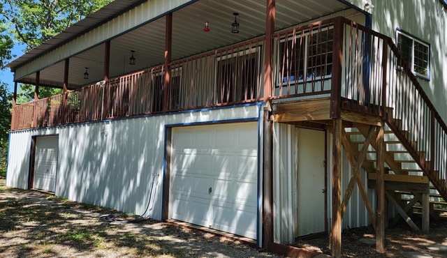 The home is lakefront, perfect! From the roadside, it's nearly impossible to see
