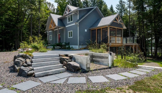 The Huron Woods Retreat with Sauna & Sports Court
