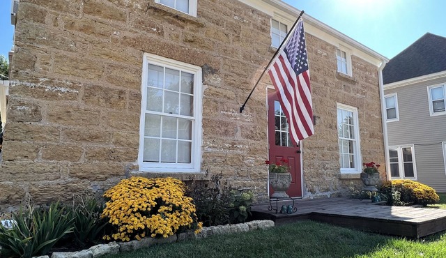 The Iowa Stone House. Enjoy Historic Charm and Spacious Modern Comfort.