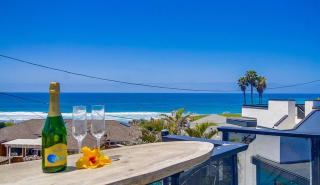 The Jetson House - 2 BD - 2BA duplex - top unit with ocean views - walk to beach