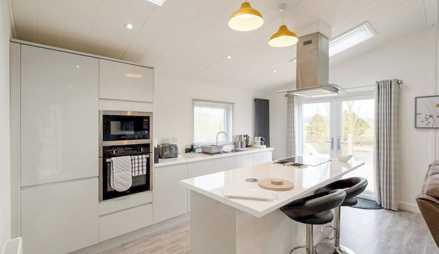 The Lake House is a beautiful 2 bedroom lodge with contemporary styling throughout.