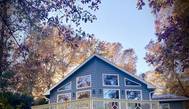 The lake is calling! Stunning views and short walk to the water!