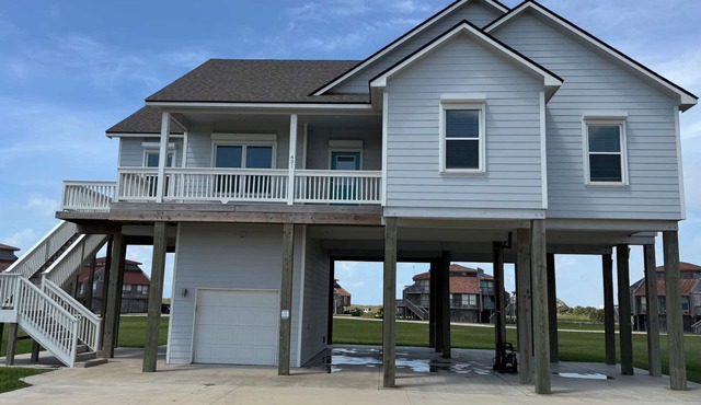 "The Lazy Coconut," a family and pet-friendly home in beach walking distance.