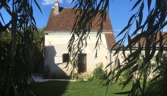 The little house in the flower garden