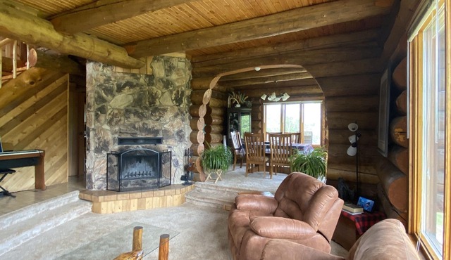 The Lodge-Unique log home on the banks of the river