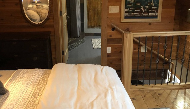 The Loft King Room w/full kitchen in historic Carriage House building.