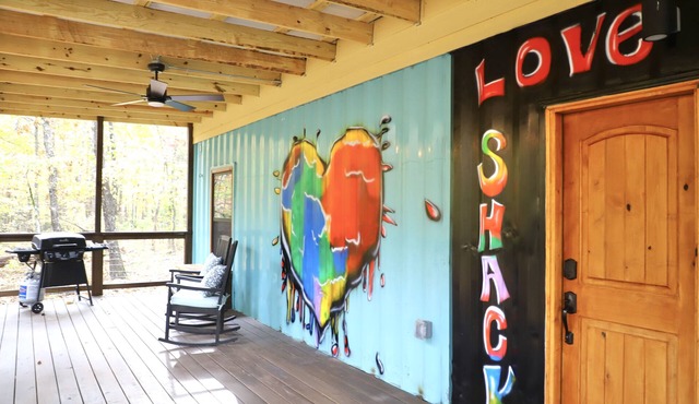 The LOVE Shack Shipping Container Tiny Home in the woods near the BNR park