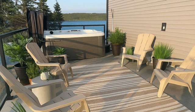 The Luxurious Lakefront Reset on Porters Lake with private beach and hot tub!