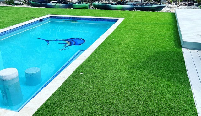 The most setup home in BPK TIKI HUT,POOL ,GRILL ,CANAL FRONT, FREE UNLIMITED ICE