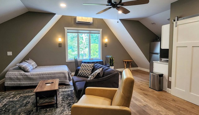 "The Nest" is a unique hideaway in the woods with convenient access.