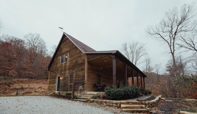 The Nest - The Nest at Pine Creek CabinsCamping Resort in Hocking Hills, just minutes from Hocking Hills State Park! A charming, cozy, pet-friendly cabin. A great gathering space also offering plenty of privacy. Book your nest among the trees!