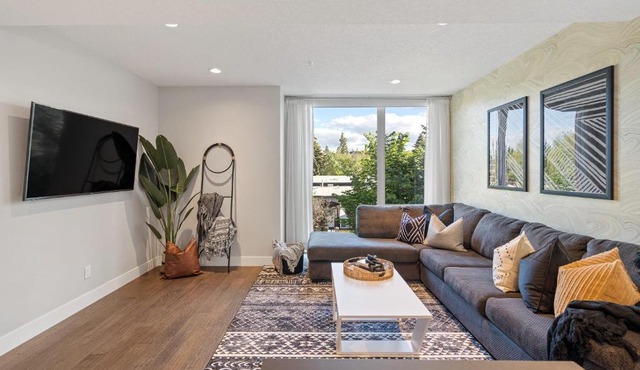 The Noma I Private Rooftop Patio I Marda Loop I TV