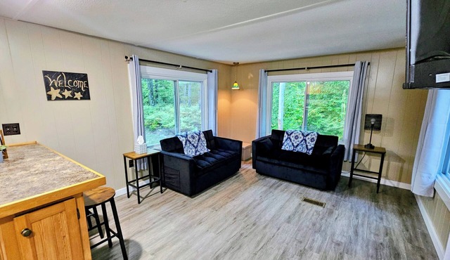 The Northwoods Den- A terrific 2-bedroom house on 9 secluded acres in Luther MI