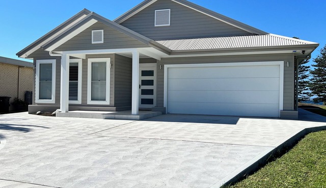 The Ocean’s Edge is a contemporary coastal home with stunning beach views.