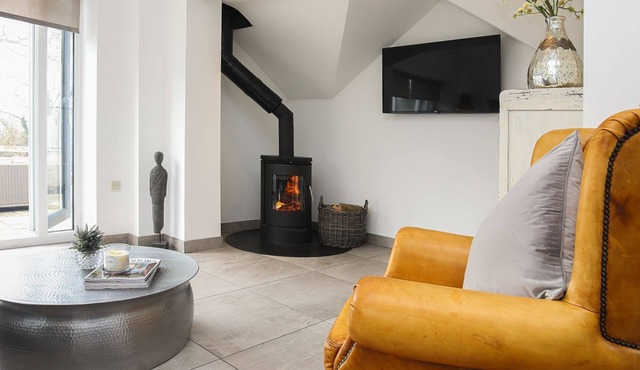 The Old Piggery - a cosy fire that sleeps 2 guests in 1 bedroom